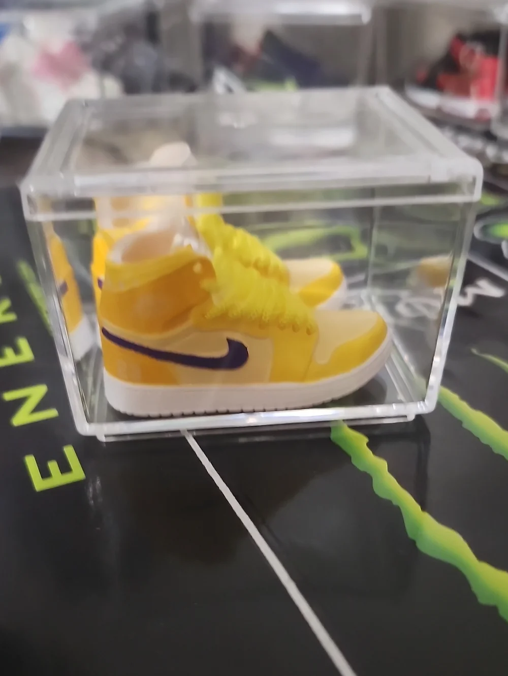 Yellow Mini Sneaker Display with Navy Swoosh